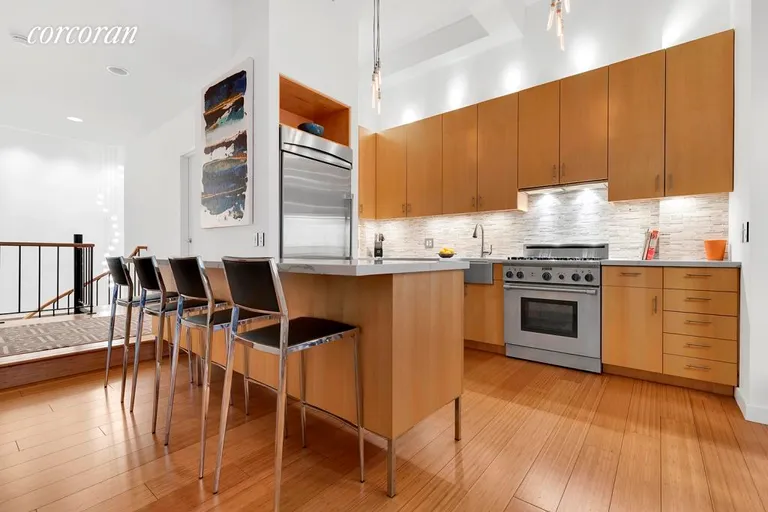 New York City Real Estate | View 233 West 26th Street, 1E | Pristine Open Chef's Kitchen | View 2