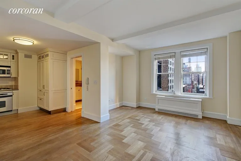 New York City Real Estate | View 27 West 72nd Street, 1008 | Spacious living room with open city views | View 5