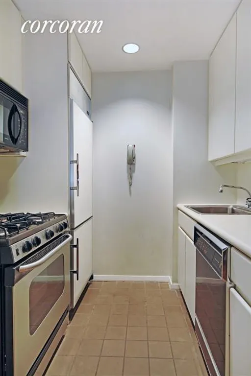 New York City Real Estate | View 100 United Nations Plaza, 6F | Kitchen with SubZero Refrigerator | View 2