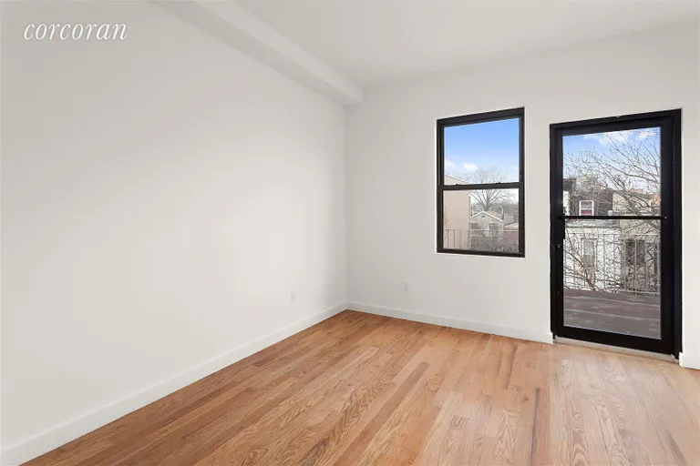 New York City Real Estate | View 119 Pulaski Street | Master Bedroom w/ Terrace | View 5
