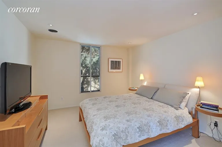 New York City Real Estate | View 21 State Street | Master Bedroom with city windows | View 6