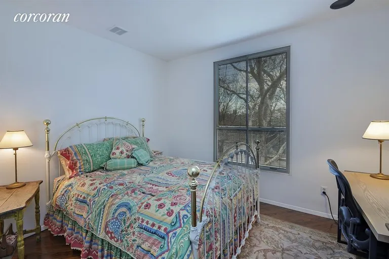 New York City Real Estate | View 21 State Street |  Bedroom with city windows | View 8