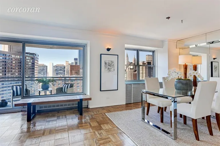 New York City Real Estate | View 400 East 56th Street, 32RS | Dining Area,w/views of Empire St./Chrysler Bldgs.  | View 2