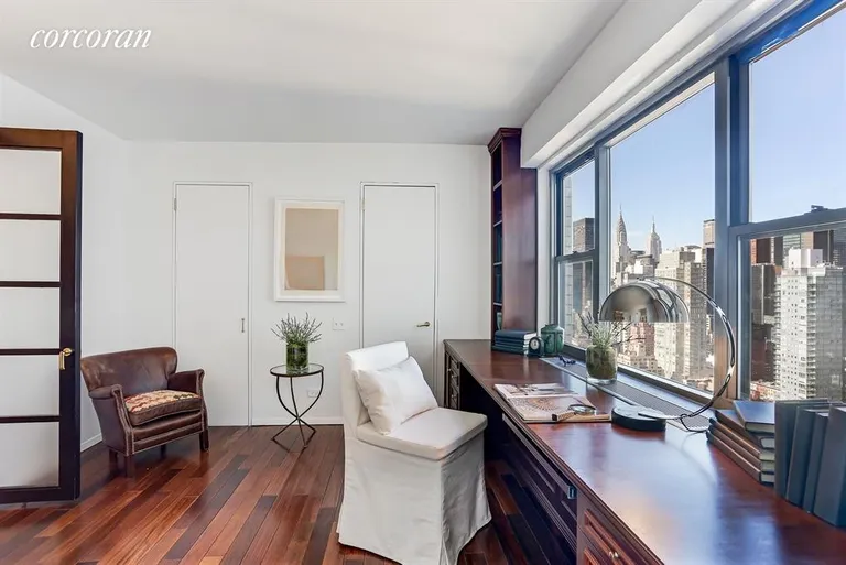 New York City Real Estate | View 400 East 56th Street, 32RS | Bedroom that is being used as a Office/Library | View 7