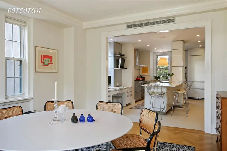 New York City Real Estate | View 160 Henry Street, 5A | Dining room and kitchen beyond | View 4