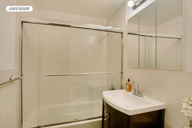 New York City Real Estate | View 225 East 57th Street, 3K | Tastefully Renovated Bathroom | View 6