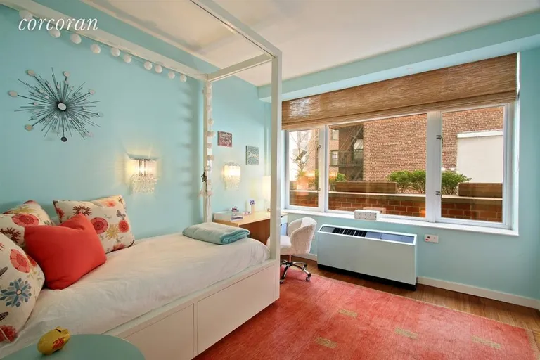 New York City Real Estate | View 201 West 17th Street, 2A | Kids Bedroom overlooking terrace | View 8