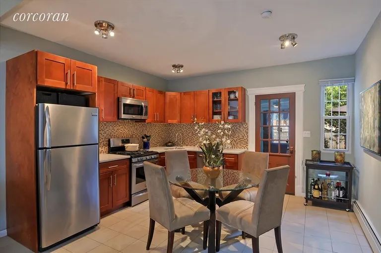 New York City Real Estate | View 3907 Snyder Avenue | Kitchen leading to a zen garden | View 2