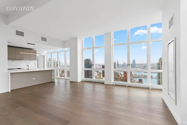 New York City Real Estate | View 305 East 51st Street, 31A | Magnificent kitchen overlooking Dining Area   | View 6