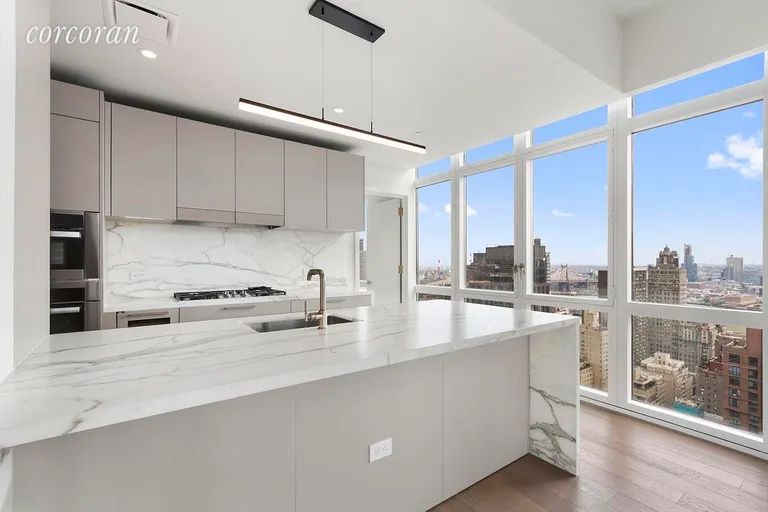 New York City Real Estate | View 305 East 51st Street, 31A | Kitchen with best views in Manhattan!   | View 7