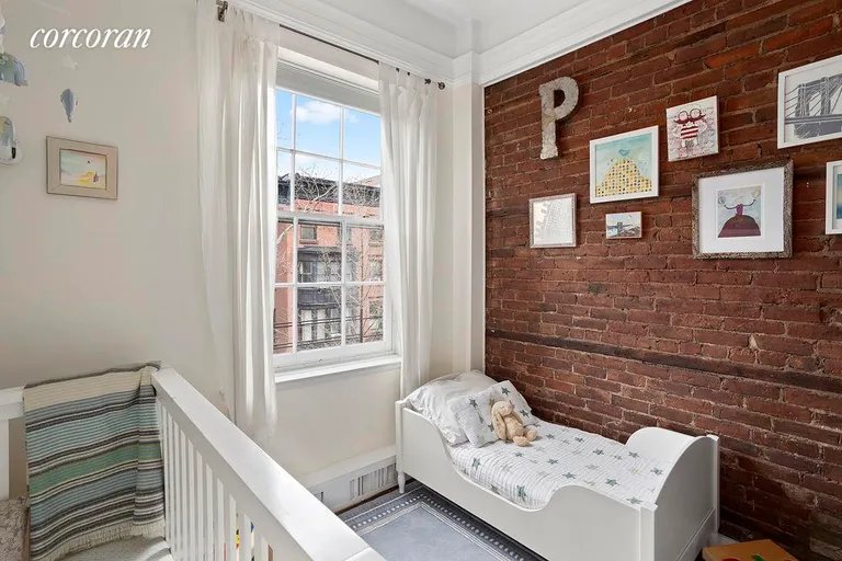 New York City Real Estate | View 173 Hicks Street, 5AB | Exposed brick walls in 2nd bedroom and living room | View 8