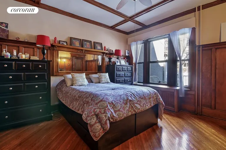 New York City Real Estate | View 517 73rd Street | Bedroom with Coffered Ceiling & Wainscoting | View 4