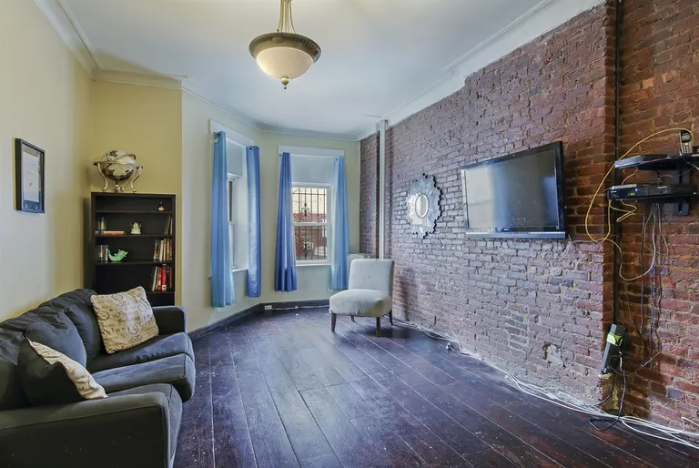 New York City Real Estate | View 382 Chauncey Street | Exposed brick wall and high ceilings  | View 2