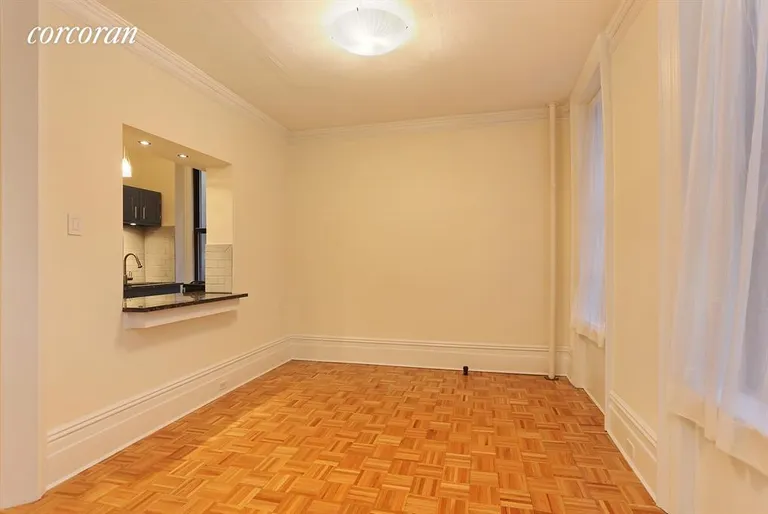 New York City Real Estate | View 175 Claremont Avenue, 3 | Living Room with Pass Thru to Kitchen | View 2
