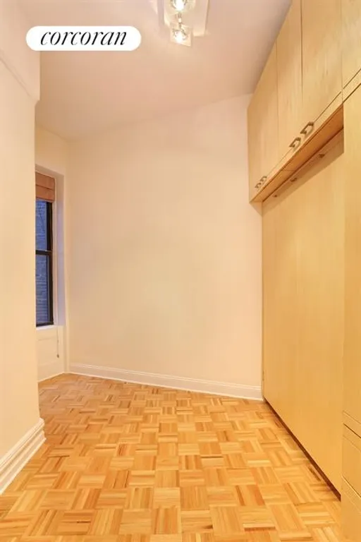 New York City Real Estate | View 175 Claremont Avenue, 3 |  Bedroom with Custom Cabinetry and Murphy Bed | View 4