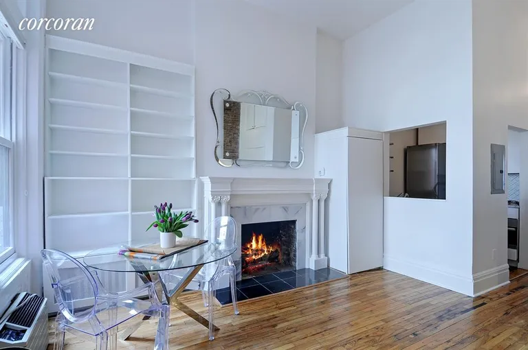 New York City Real Estate | View 151 West 85th Street, 3 | Dining area with wood-burning fireplace | View 2