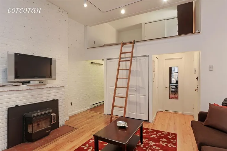 New York City Real Estate | View 311 West 82nd Street, 1A | Exposed Brick Fireplace and Stand-up Loft | View 2