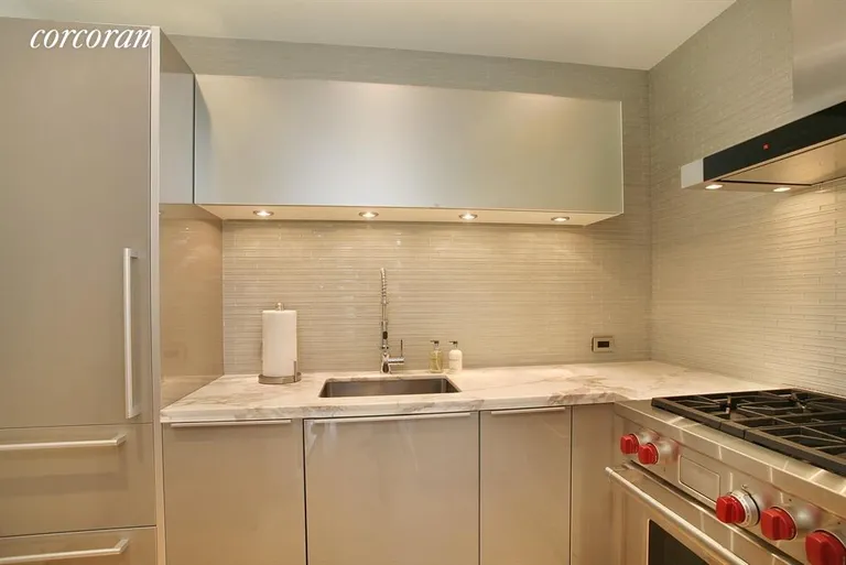 New York City Real Estate | View 785 Fifth Avenue, 7B | Designer Kitchen | View 6