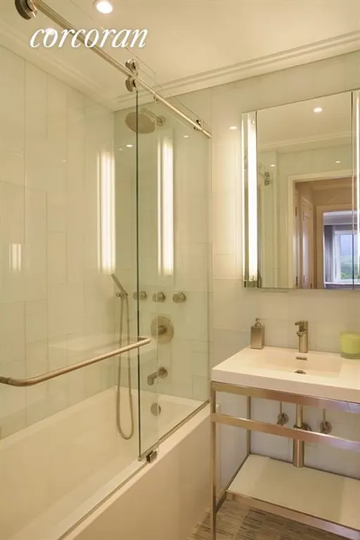 New York City Real Estate | View 785 Fifth Avenue, 7B | Designer Bathroom with Glass Tiles | View 7