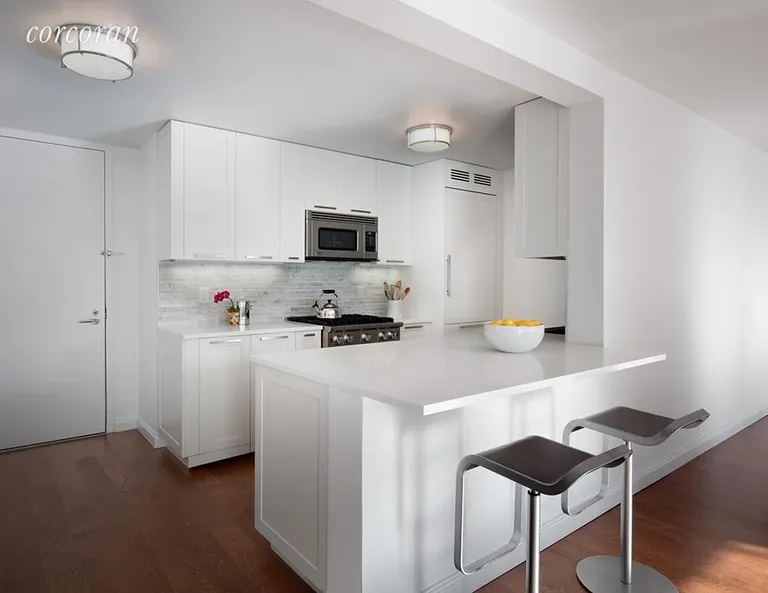 New York City Real Estate | View 200 East 94th Street, 117 | Kitchen with Viking and Sub-Zero appliances | View 2