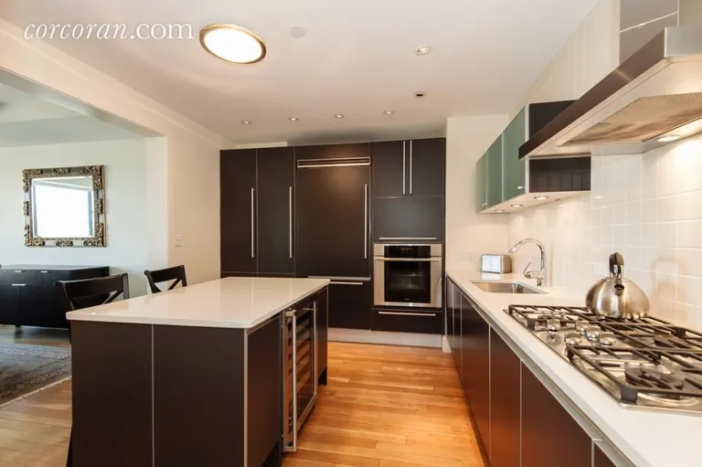 New York City Real Estate | View 110 Central Park South, 9A | Kitchen Opens to Dining Room | View 2