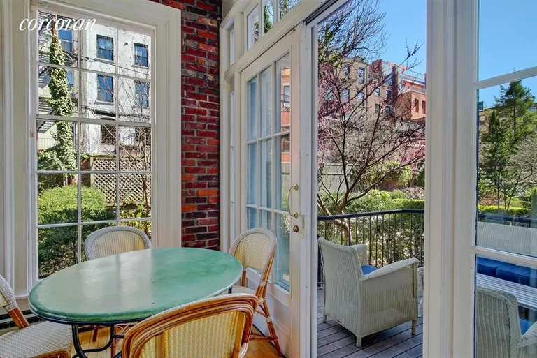 New York City Real Estate | View 31 Garden Place | Eat in kitchen and terrace | View 7