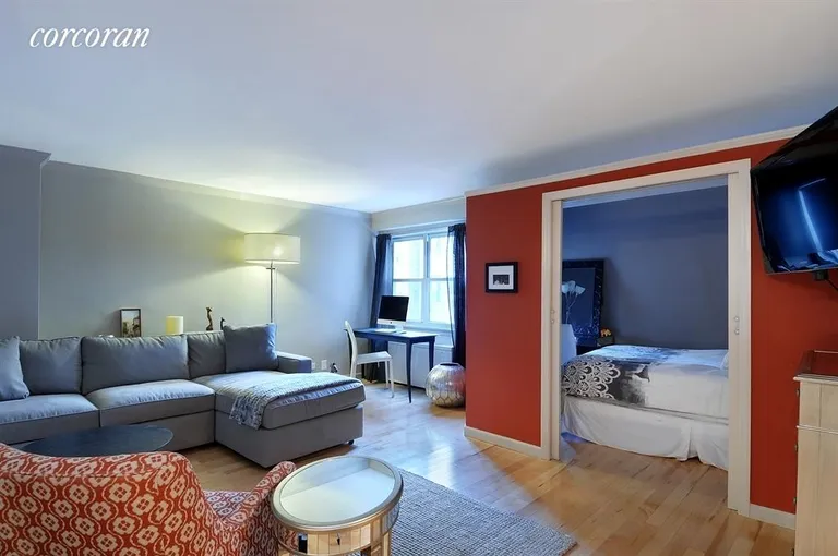 New York City Real Estate | View 101 West 12th Street, 5Z | Living Room with Sleeping Area | View 3
