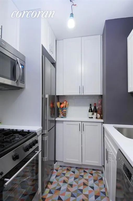 New York City Real Estate | View 101 West 12th Street, 5Z | Renoveted Kitchen | View 2