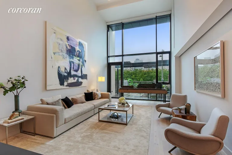New York City Real Estate | View 130 Furman Street, S405 | Double Height Living Room | View 4