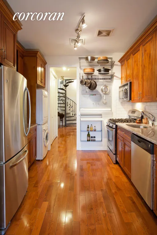 New York City Real Estate | View 121 West 131st Street, 4 | Open and roomy w/GE stainless and granite counters | View 2