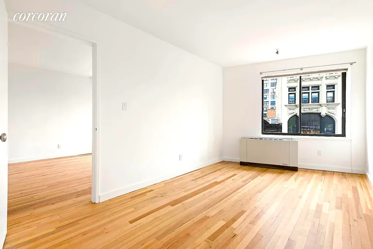 New York City Real Estate | View 67 East 11th Street, 723 | Bright and Sunny East Exp Bedroom | View 2