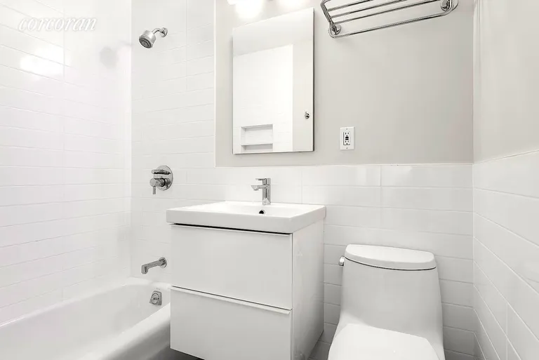 New York City Real Estate | View 67 East 11th Street, 723 | Shiny New Bath w Hanz Grohe | View 3