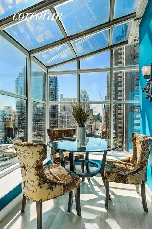 New York City Real Estate | View 444 East 75th Street, 20C | Solarium/Dining Room...Light and Views | View 4