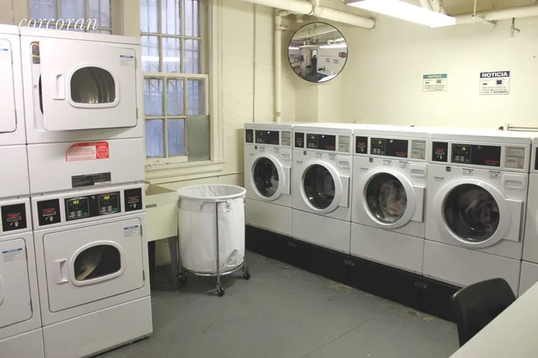 New York City Real Estate | View 50 Plaza Street East, 11B | Central Laundry Room | View 11