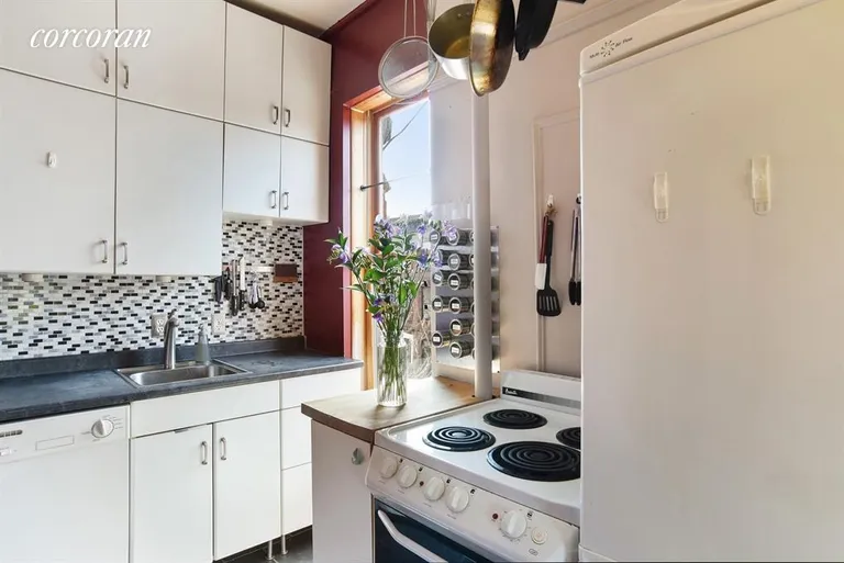 New York City Real Estate | View 19 7th Avenue, 3F | South facing kitchen with copious amounts of light | View 2