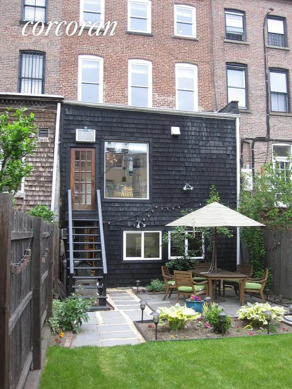 New York City Real Estate | View 538 State Street | Well planted garden and patio | View 13