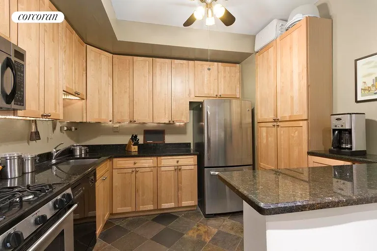 New York City Real Estate | View 101 West 81st Street, 402 | Open Kitchen with Breakfast Bar | View 3