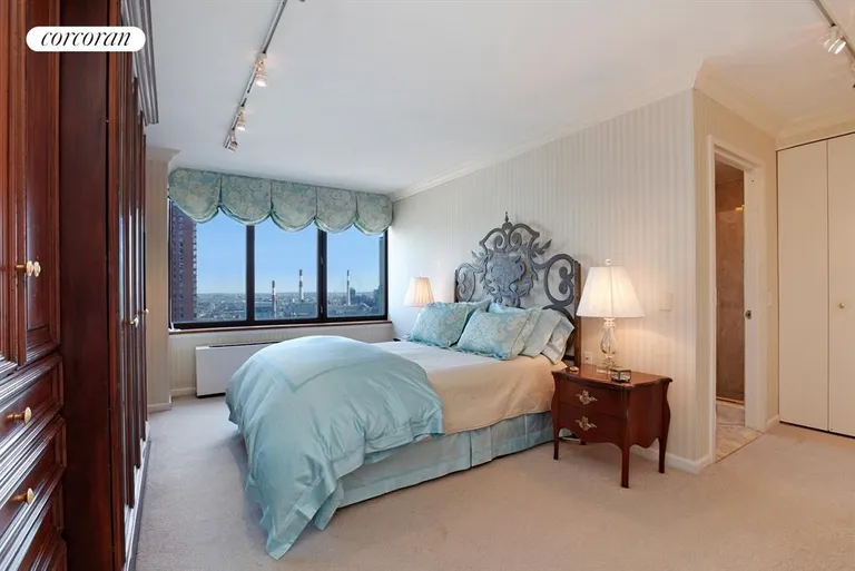 New York City Real Estate | View 422 East 72nd Street, 30A | Master suite enjoys open eastern river views | View 8