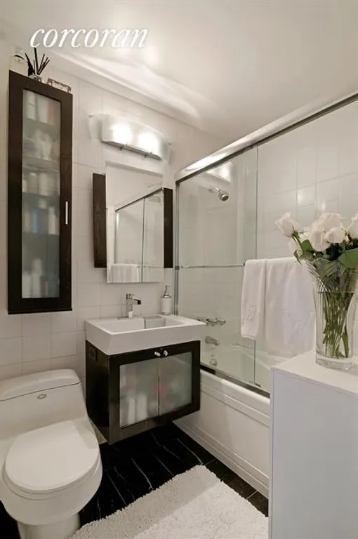 New York City Real Estate | View 353 East 72Nd Street, 24D | Renovated Bathroom with Marble Floors | View 5
