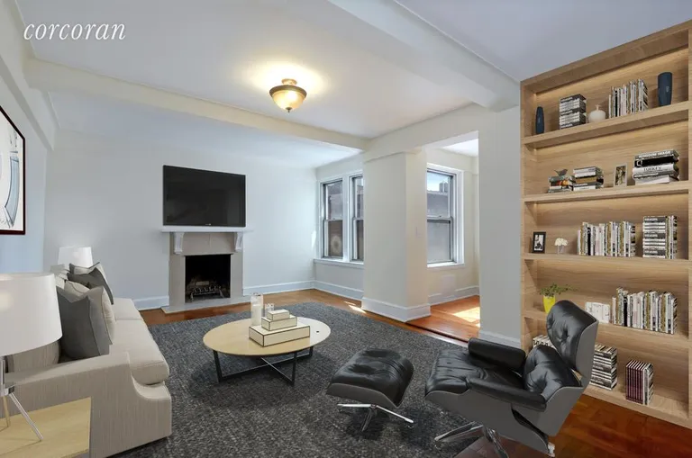 New York City Real Estate | View 136 Waverly Place, 8A | Living Room with Western Exposure and WBFP | View 2