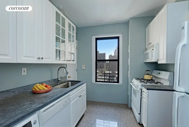 New York City Real Estate | View 220 West 93rd Street, 12C | Chef's kitchen with east-facing window | View 3