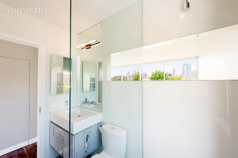 New York City Real Estate | View 97 Douglass Street, PH Duplex | Master bath with skyline view from shower | View 9