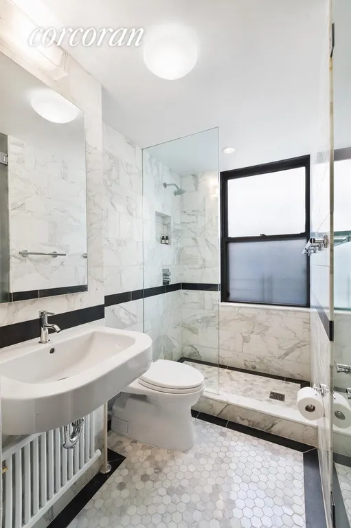 New York City Real Estate | View 135 Eastern Parkway, 13G | Gorgeous Marble Guest Bath | View 9