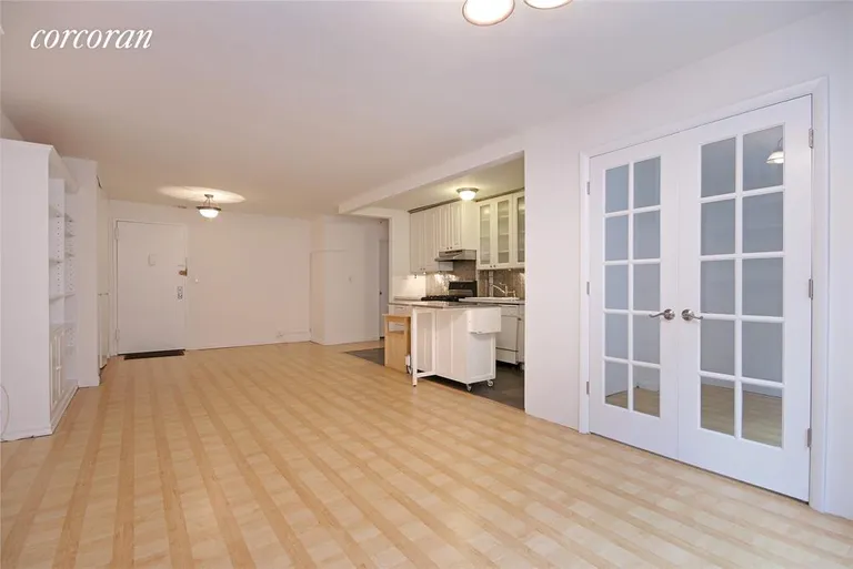 New York City Real Estate | View 201 East 36th Street, 5F | Reverse shot of Living, Dining, and Open Kitchen | View 2