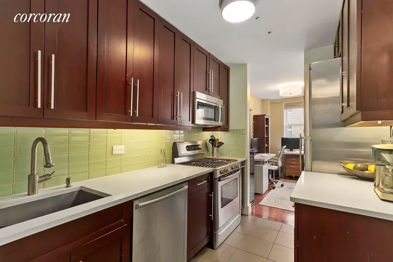 New York City Real Estate | View 215 East 80th Street, 5A | Modern kitchen w/ stainless steel appliances. | View 3