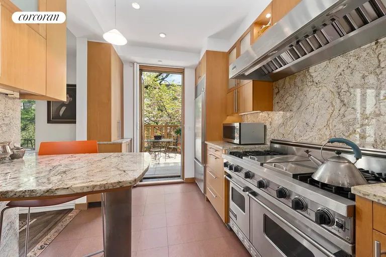 New York City Real Estate | View 133 Pacific Street, 2 | Designer Chef's Kitchen Leads to Terrace | View 5