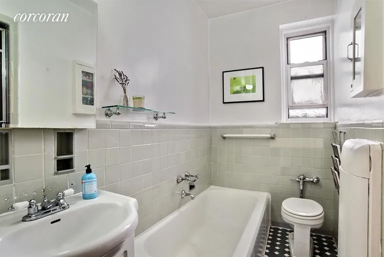 New York City Real Estate | View 1825 Foster Avenue, 5F | Soak or use the shower (hidden behind the door)! | View 5