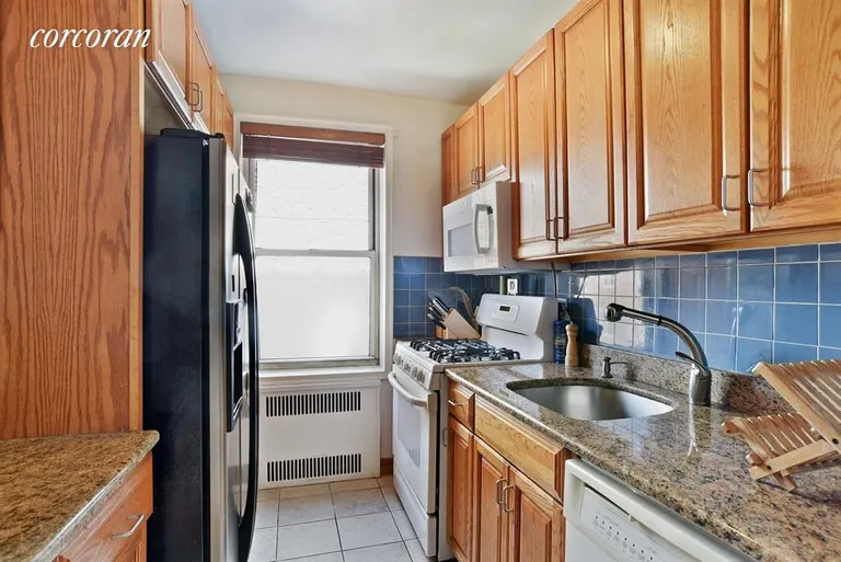 New York City Real Estate | View 1825 Foster Avenue, 5F | Windowed kitchen with lots of storage | View 3