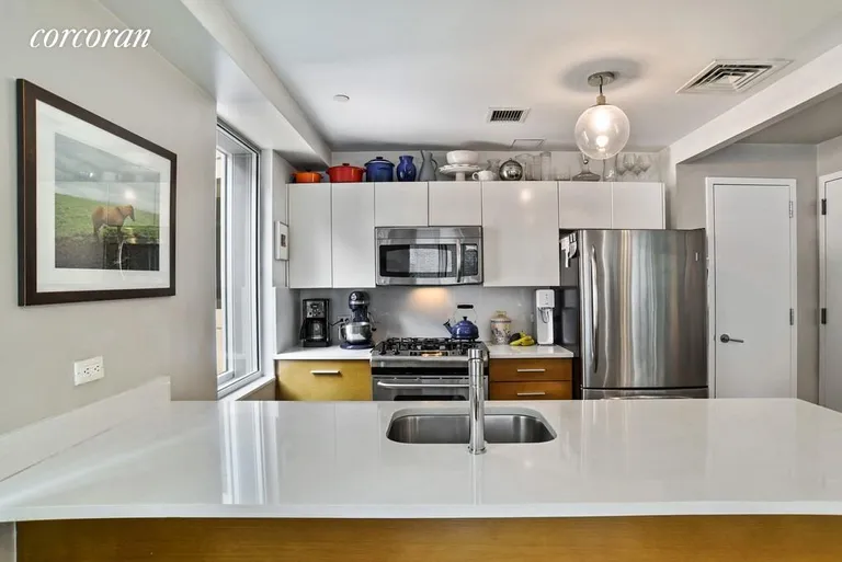 New York City Real Estate | View 133 Water Street, 7A | Command the party from your open kitchen | View 3