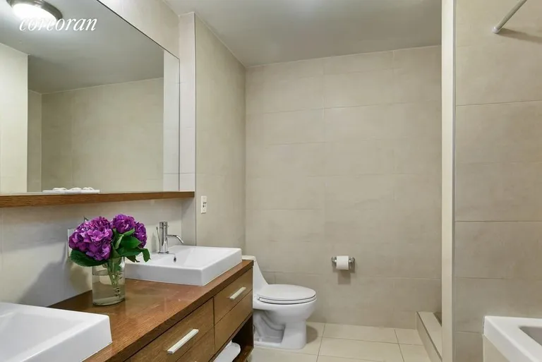New York City Real Estate | View 133 Water Street, 7A | En suite bath with tub and shower | View 5